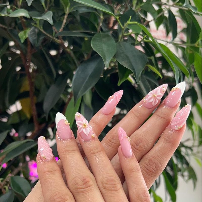 Pink almond nails with 3D flowers and gold beads